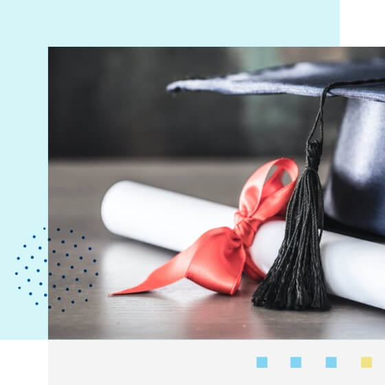 Image of a graduation hat and a diploma with a red ribbon