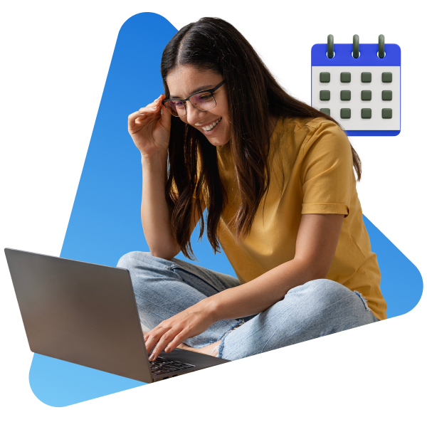 Girl smiling at computer screen